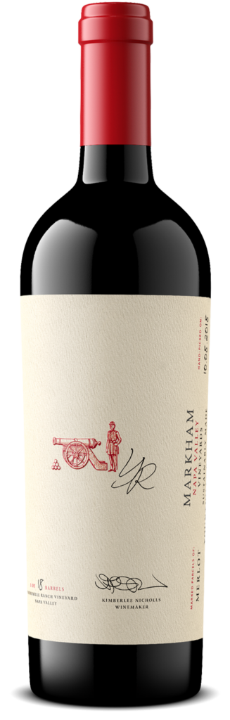 Merlot bottle with logo of a man behind a cannon visible, along with a small signature.