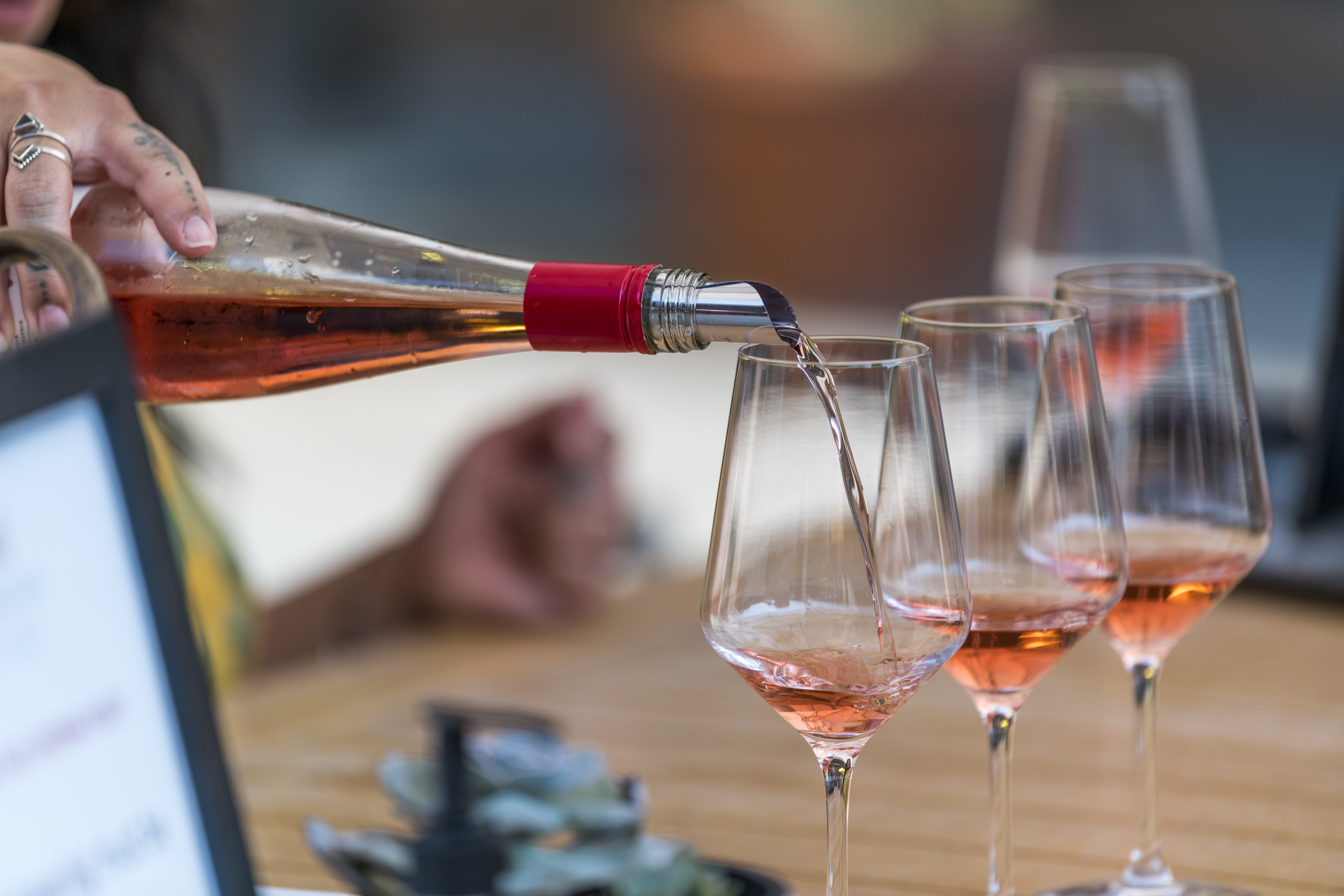 Rosé poured to guests upon arrival to Tasting Room