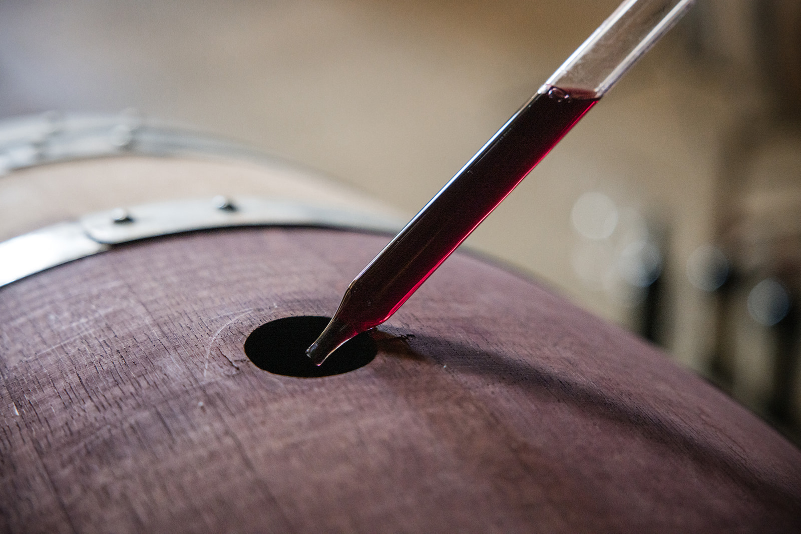 wine being drawn from barrel for barrel tasting at Markham