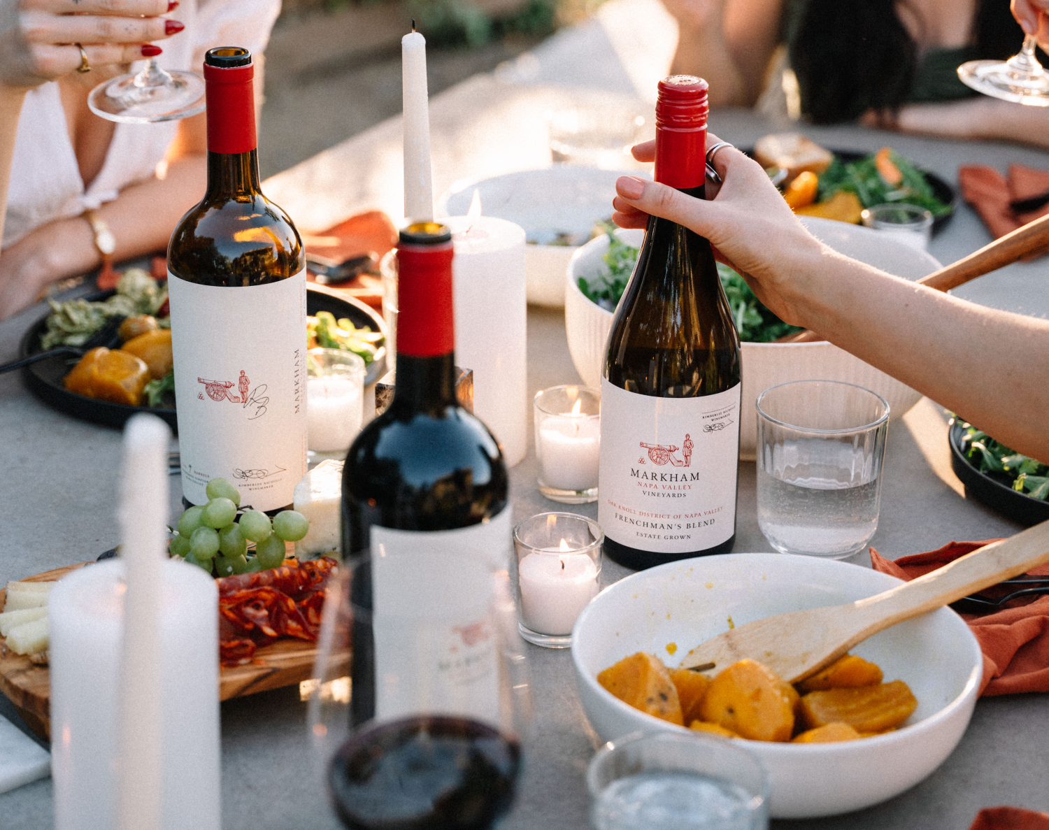 Markham wines and food pairings on a dinner table